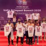 Shirtless protest at AI Summit