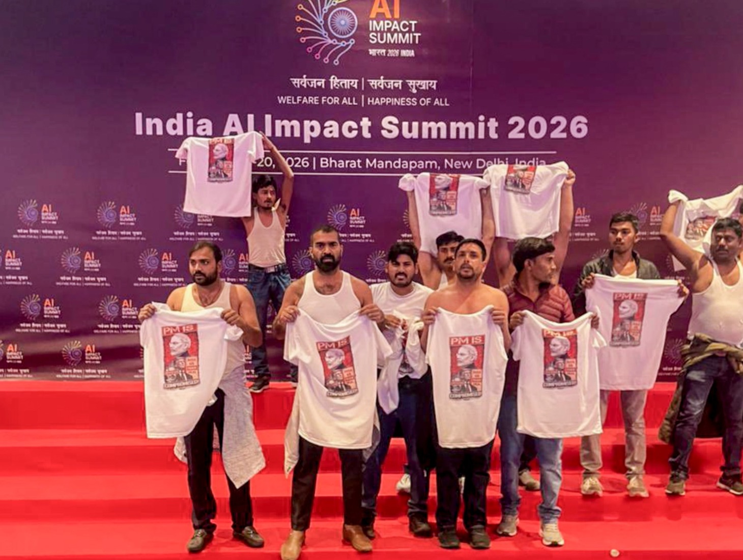 Shirtless protest at AI Summit