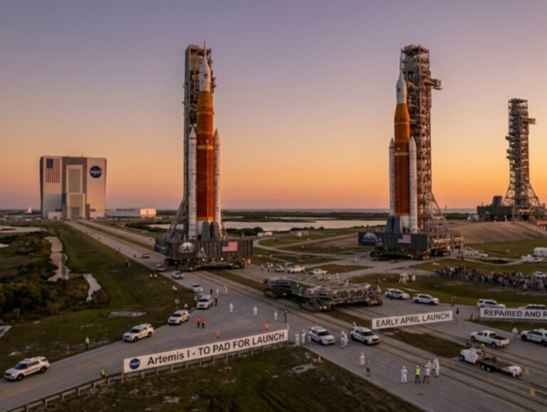 NASA hauls its repaired moon rocket from hangar back to pad for early April launch