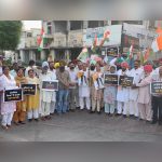 District Congress chief Gursharan Kaur Randhawa leads protest as party workers demand withdrawal of case against Rahul Gandhi.